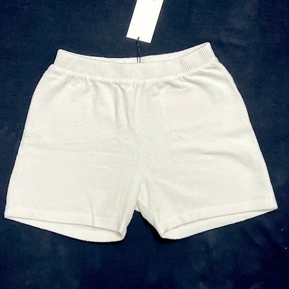 Brand new cozy stretchy ivory shorts. Never been worn before. Size XS