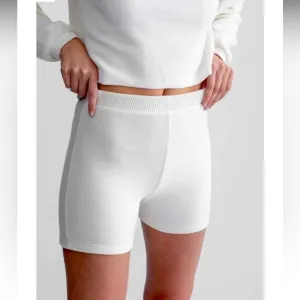 Brand New cozy stretchy ivory shorts. Never worn before. Size M with tags on