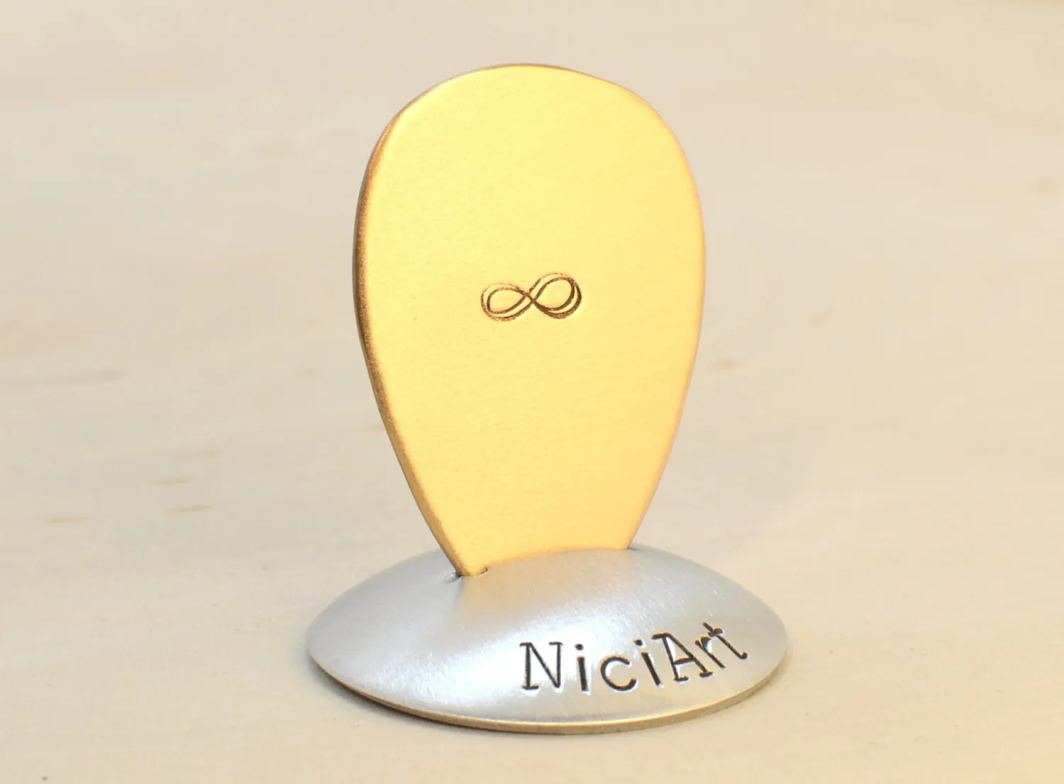 Infinity on Jazz Style Teardrop Guitar Pick in Bronze